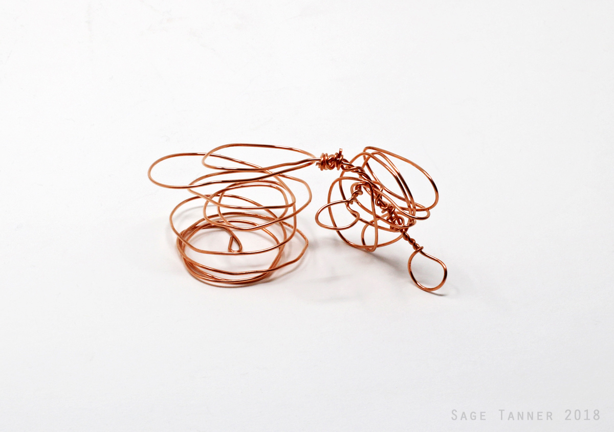 A small abstract creature made of copper wire, three of six.