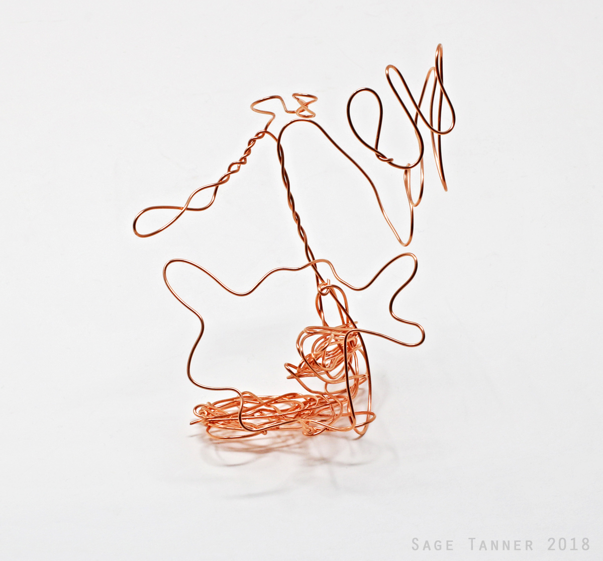 A small abstract creature made of copper wire, four of six.