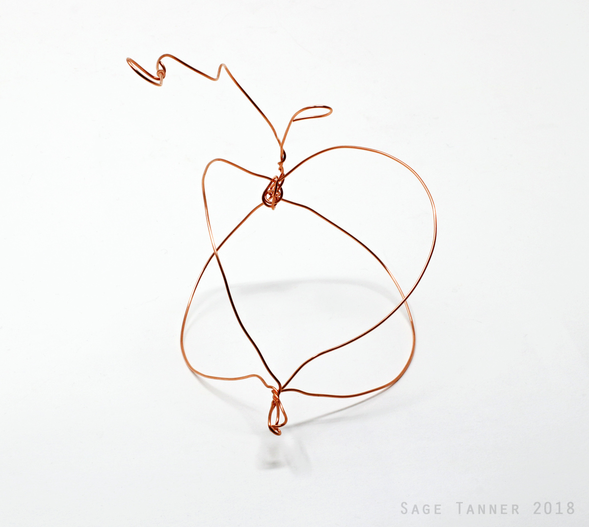 A small abstract creature made of copper wire, six of six.